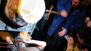 Illustration for article titled Shot-Glass Printing Bot, Darko-Like Rabbit, Molten Beer Bong Turn Up at Roboexotica "Cocktail Robotics" Convention